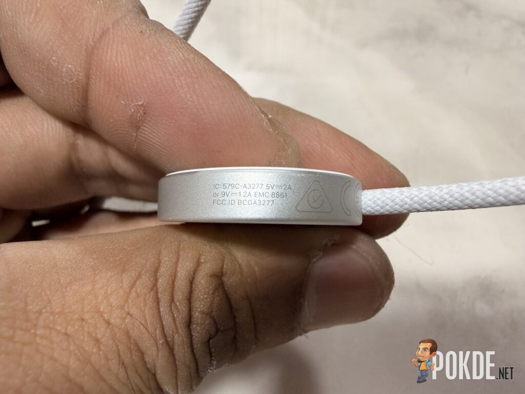 Apple Watch Series 12 Review - Health First, Finally Fun - 25 Apple Watch Series 12 new charger puck with model A3277 markings
