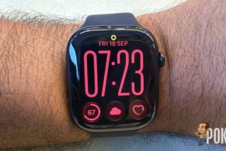 Apple Watch Series 12 on the wrist showing the Siri Modular watch face in red